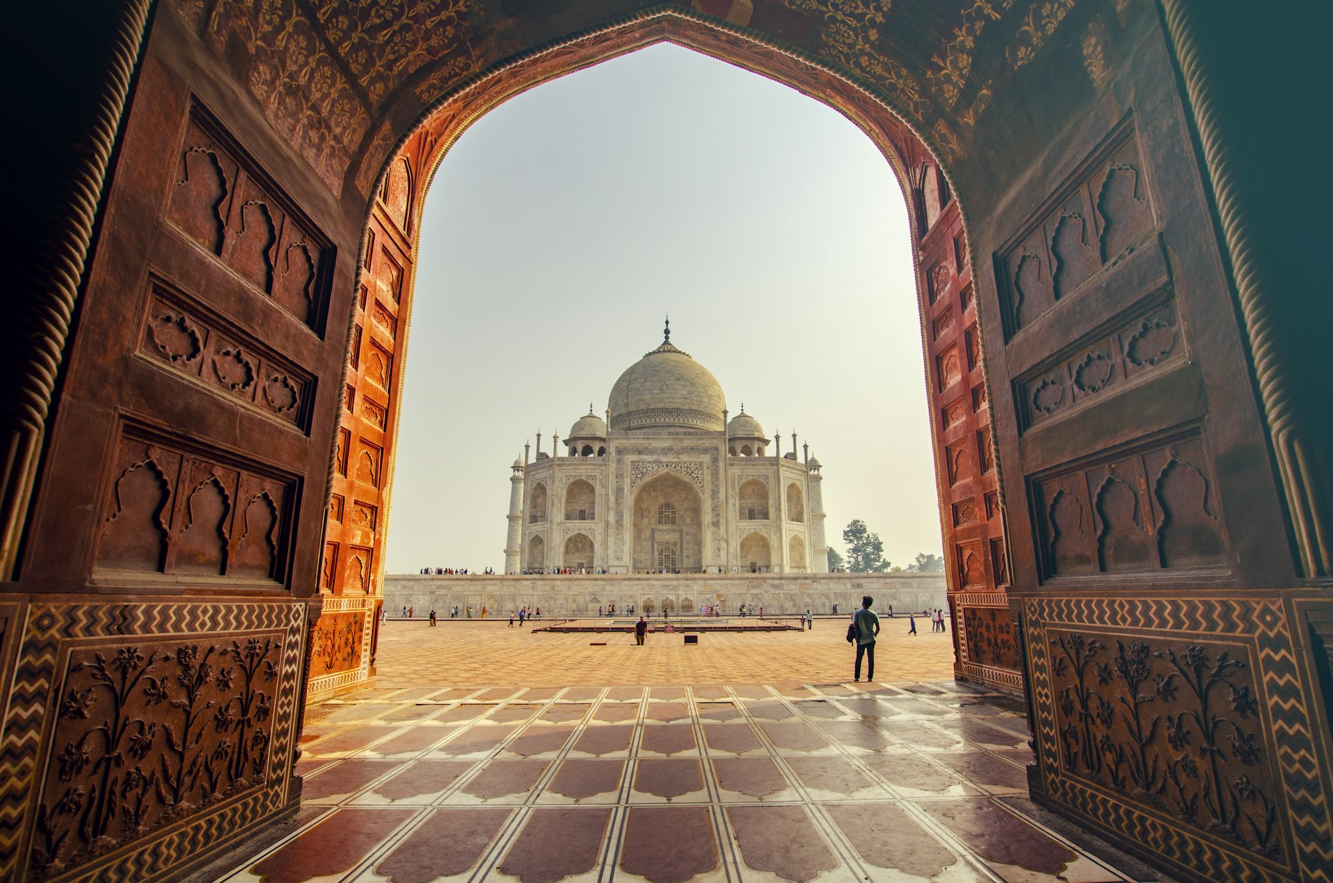 The Taj Mahal in Agra glowing at golden sunrise