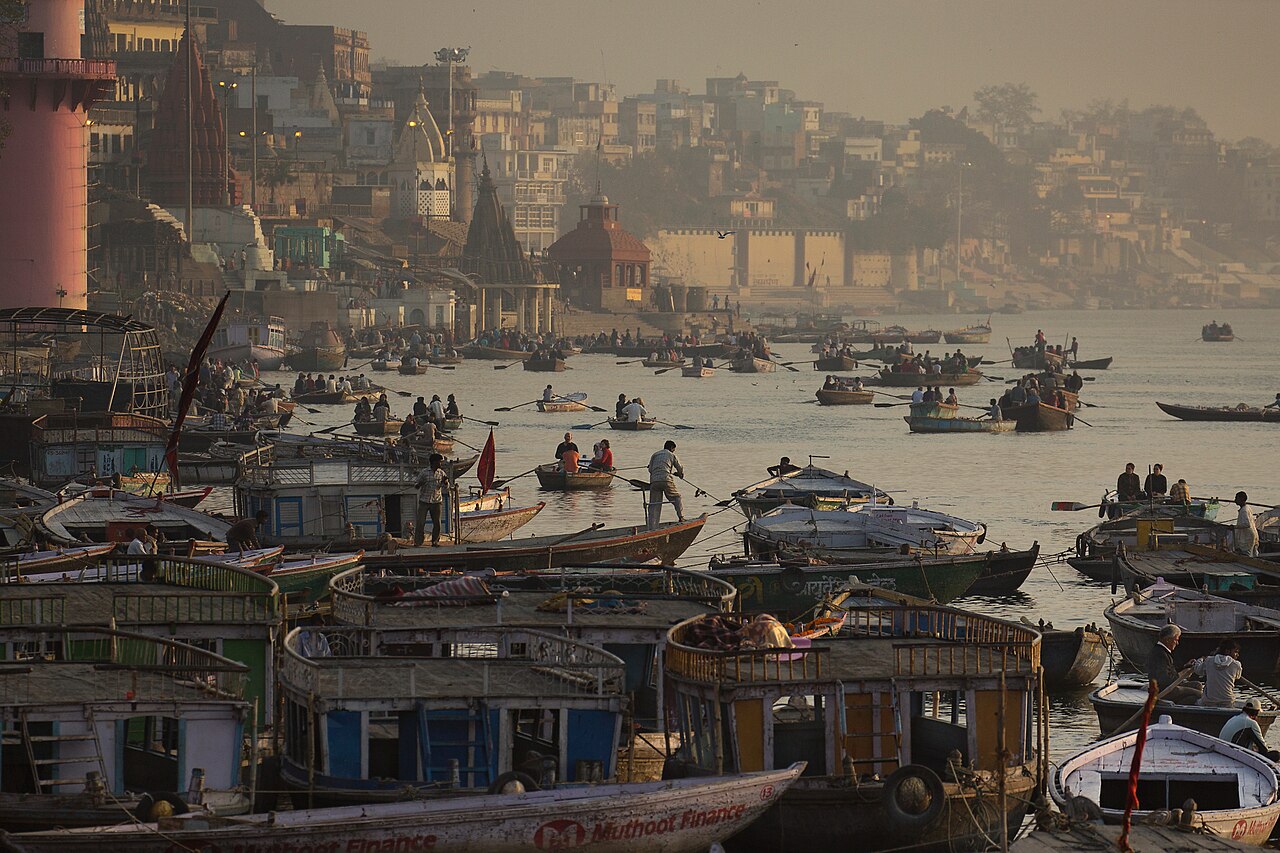 Boats along the riverside ghats of Varanasi at dawn
